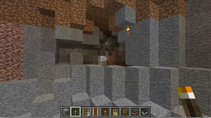 The stone wall in front of the side cave; I carved a path into the stone going around it on the left
