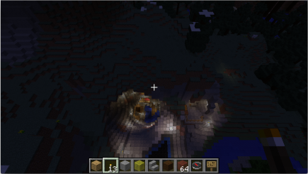A nighttime view from above the cave